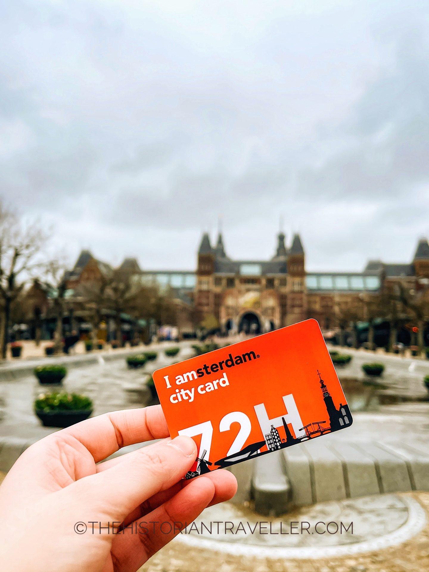 i amsterdam city card in the background of the Rijskmuseum