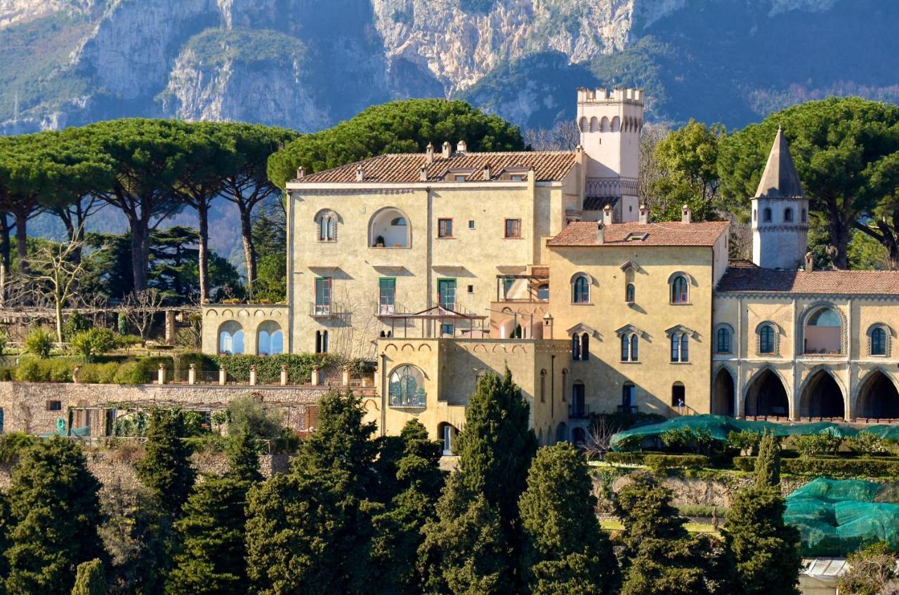 Best things to do in Ravello - Hotel villa Cimbrone main facade with mountain backdrop - Photo courtesy of Booking.com