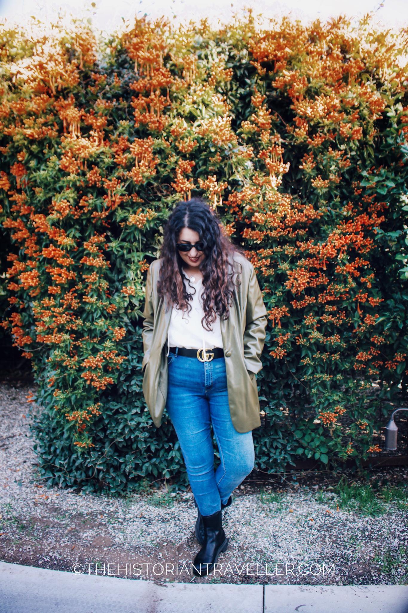 Laura posing on a bush. Gucci Belt and leather jacket -Donna Carmela Resort