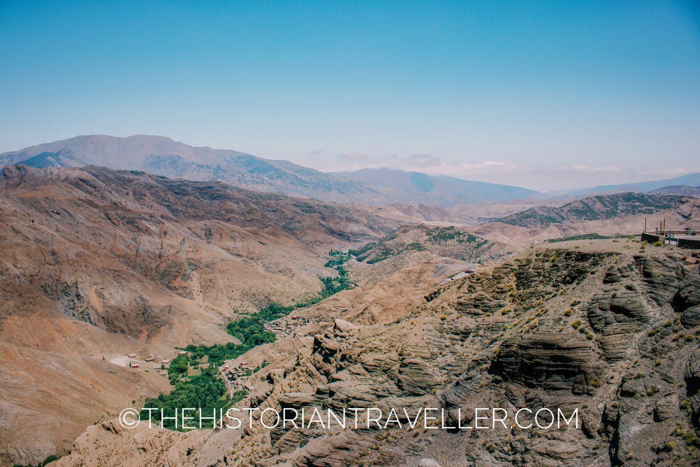 Road of Thousand Kasbahs itinerary -  Driving the High Atlas Mountains, view from the car and oasis in the valley