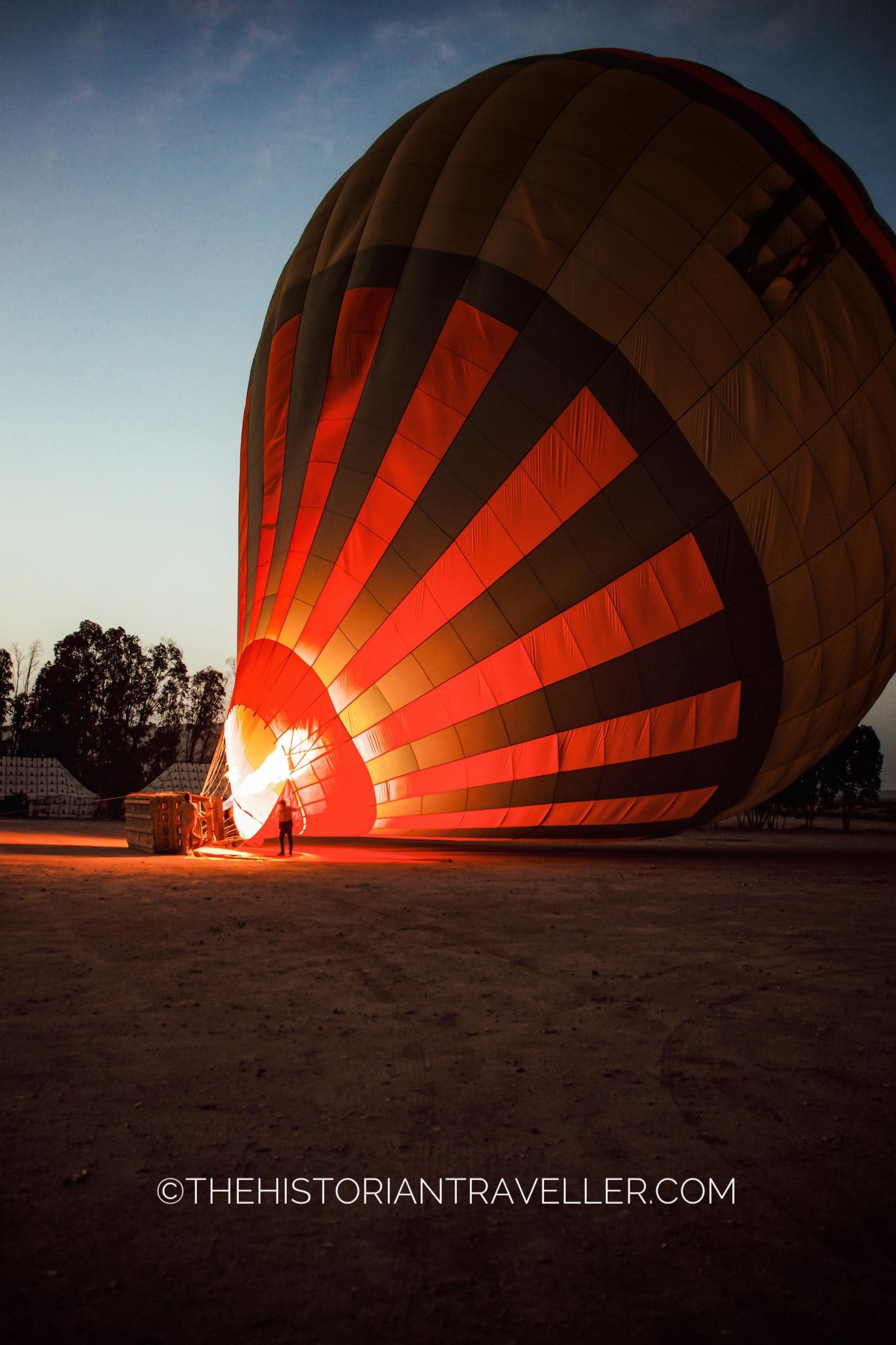 Hot air balloon in Marrakech  - inflating balloon in the dark